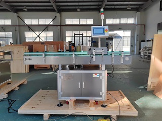 2025.11.18瑞典立式圆瓶贴标机+转盘1台